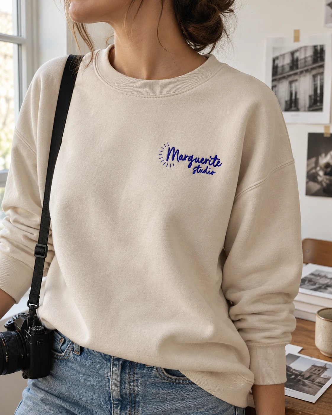 Sweat portant l’identité de Marguerite Studio
